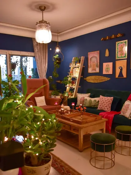 The evening glow in my living room during the festive season. The fairy lights on the ladder shelf and the warm ambient lighting create a magical atmosphere.