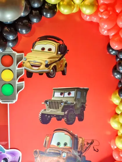 A close-up of the traffic light and other character details from a Cars themed party.