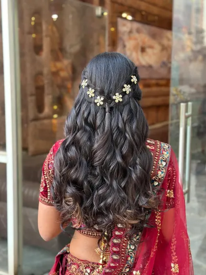 A final look at the intricate and beautiful half-updo with floral clips.