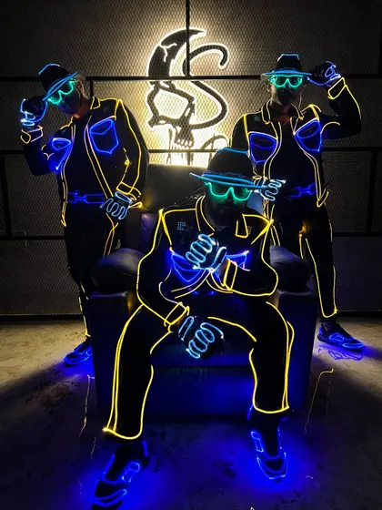 A cool pose in our 'Bhool Bhulaiyaa' inspired costumes, complete with glowing glasses. We love recreating iconic looks with our own LED twist.