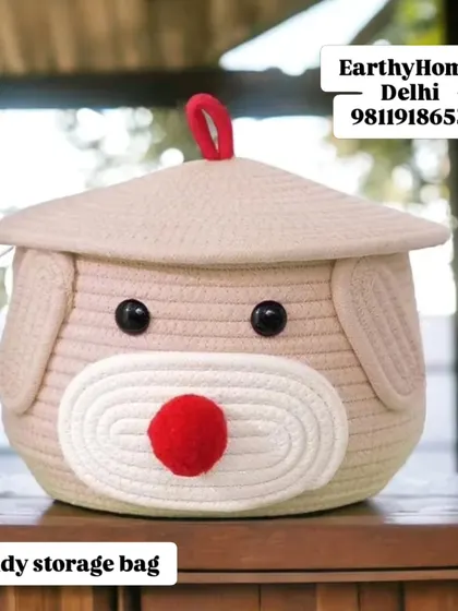 Our teddy dog storage bag in a soft beige color. The cute red nose and floppy ears make it an irresistible addition to a child's bedroom.