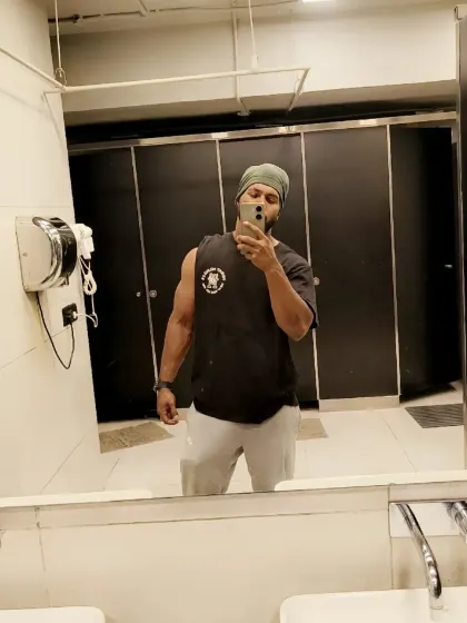 Mirror selfie in the washroom. The work doesn't stop when the workout ends. It's a 24/7 lifestyle.
