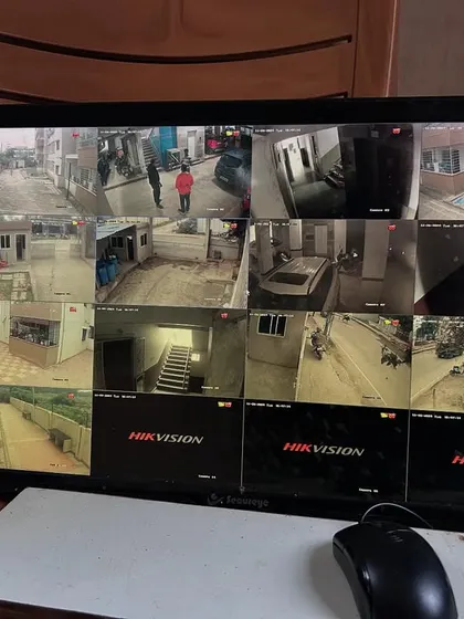 This 16 channel view shows a comprehensive security setup for a large residential complex, covering multiple floors and common areas.