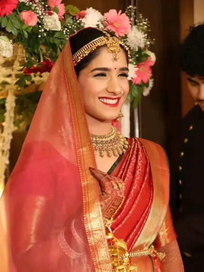 A candid shot of the bride during the ceremony. Her makeup is subtle and elegant, allowing her to look and feel her best during the most important moments.