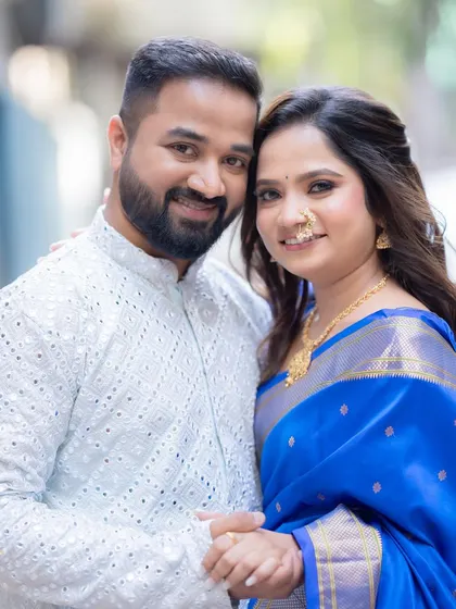 A happy and confident couple. The bride's makeup enhances her natural beauty and gives her a beautiful glow.