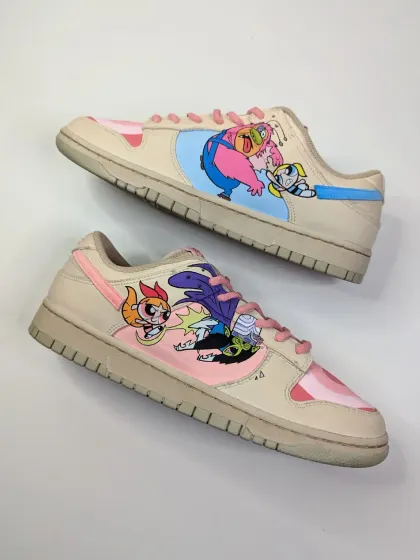 The Powerpuff Girls saving the day on a pair of custom Nike Dunks. This might be the cutest pair I've ever made, featuring Blossom, Bubbles, and Buttercup taking on Mojo Jojo.