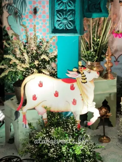A detail shot from a Krishna-themed event, featuring a beautifully painted statue of a cow, which is a sacred animal in Hinduism. This shows my commitment to authentic and culturally relevant decor.
