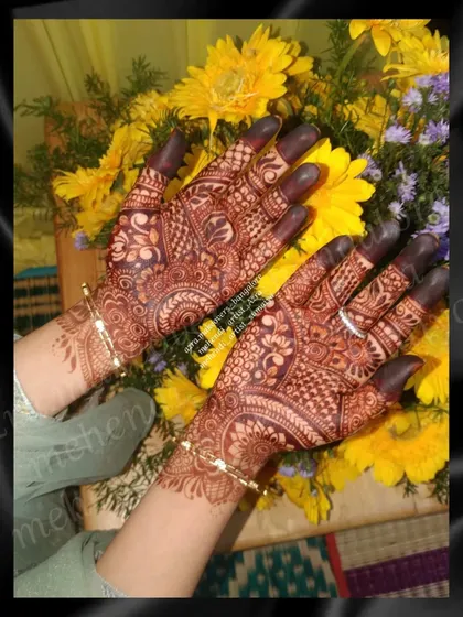 A more detailed non-bridal design, with full palm coverage and intricate patterns.