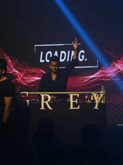 Another shot from the New Year's party, with my hand up, feeling the energy of the room.