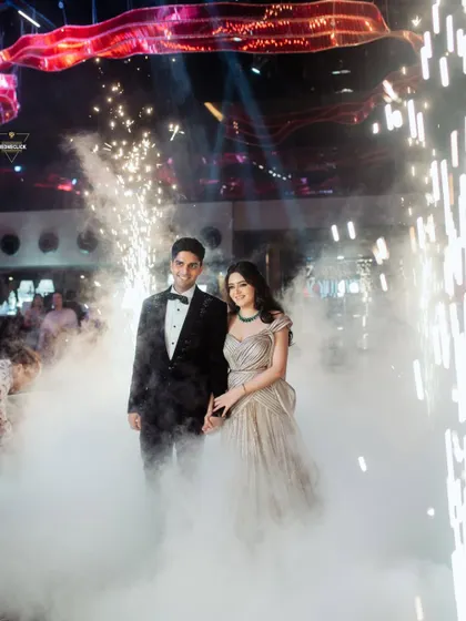 Making a grand entrance into their forever. I love capturing the energy of a reception, with sparklers, smoke, and a couple ready to celebrate their love with everyone they hold dear.