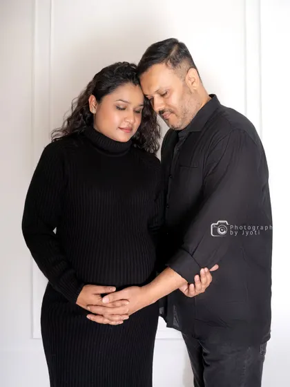 A tender pose showing the strong connection between the expecting parents. These simple, emotional shots are a beautiful part of any maternity session.