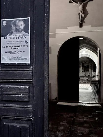 An atmospheric shot of the entrance to a church where we performed 'Little Italy'. The poster on the old wooden door creates a beautiful contrast between the past and the present.