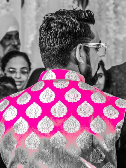 A different perspective of me hosting an event. Even from the back, you can see the engagement with the crowd, which is the most important part of my job as a wedding emcee.