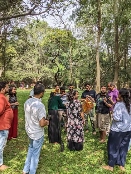 A wide shot of our community circle in Cubbon Park. It's a space for people to gather, create, and just be.