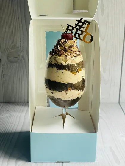 The full gift presentation of the Mocha Mirage Delight in its light blue box, ready to be gifted for Raksha Bandhan.