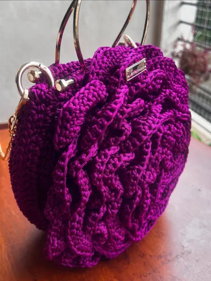 Another angle of the deep purple Rose Bag, showcasing its unique, sculptural quality.