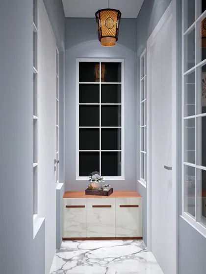 A stunning entryway that makes a grand first impression. The clean lines, marble floor, and elegant console create a space that is both inviting and luxurious.