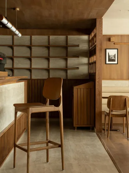 Further images from the BeWell, QBF Coffee, and Tubu projects, illustrating the consistent use of natural materials, clean lines, and thoughtful lighting to create serene and restorative commercial spaces.