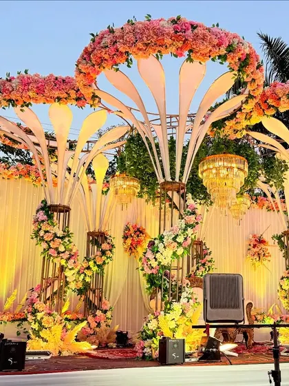 Another view of the modern floral structure stage, showing how it looks from a different angle with the warm lighting.