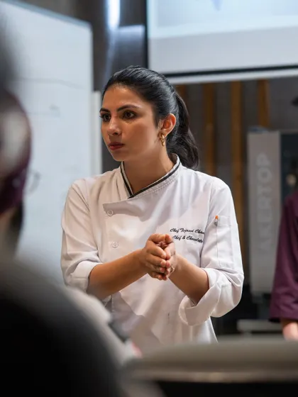 A visiting master chocolatier explains the nuances of bean-to-bar chocolate making to our students, sharing expert knowledge on sourcing and processing.