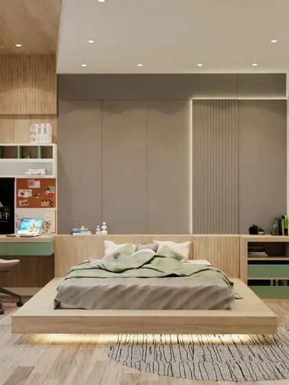 A spacious bedroom featuring a floating platform bed with under-lighting, creating a light and airy feel. The design includes a built-in study desk and a chalkboard wall for a personal touch.