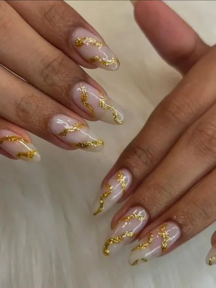 Elegant gold foil swirls on a neutral base. This is a perfect example of a sophisticated yet eye-catching design for any occasion.