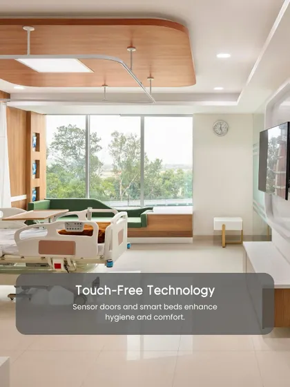 This patient room showcases the integration of touch-free technology, such as sensor doors and smart beds. These innovations enhance hygiene and comfort, contributing to a better and safer patient experience.