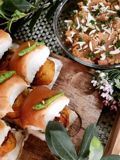 A perfect pairing for a celebration, this platter features our mini Vada Pav alongside a sweet Moong Dal Halwa, garnished with nuts.