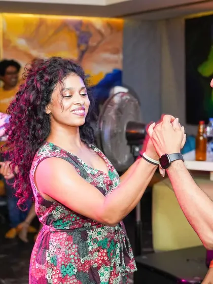 A beautiful, happy moment captured during a social dance. The connection and smiles are what make these nights so memorable.