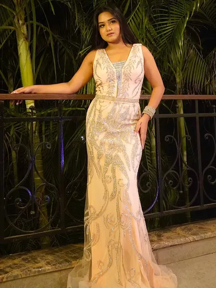 Another shot of my embellished gown for a gala dinner. Dressing for the occasion is a key part of creating a special atmosphere for the guests.
