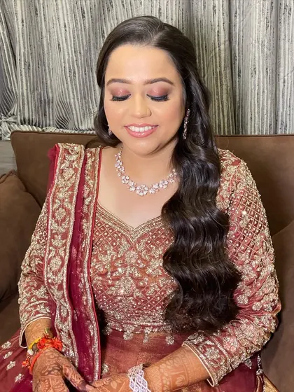 A close-up of the eye makeup for this sangeet look. I used a blend of warm browns and shimmers to create a smokey effect that makes her eyes sparkle.
