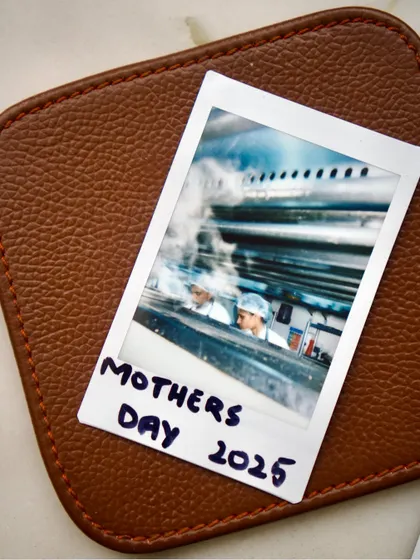 A candid shot of my team in the kitchen, captured on a Polaroid during our busy Mother's Day service.