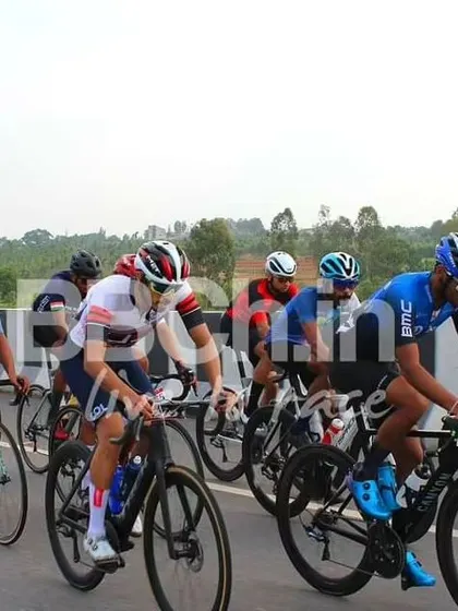 The elite peloton, a sea of focused faces and high-performance bikes.