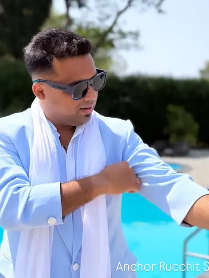 Rolling up my sleeves, ready to get to work. This light blue suit is perfect for a daytime event or a stylish pool party.