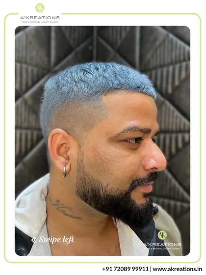 Men's hair coloring is about precision and style. This client chose a bold icy blue, which we paired with a sharp fade for a modern, edgy look.