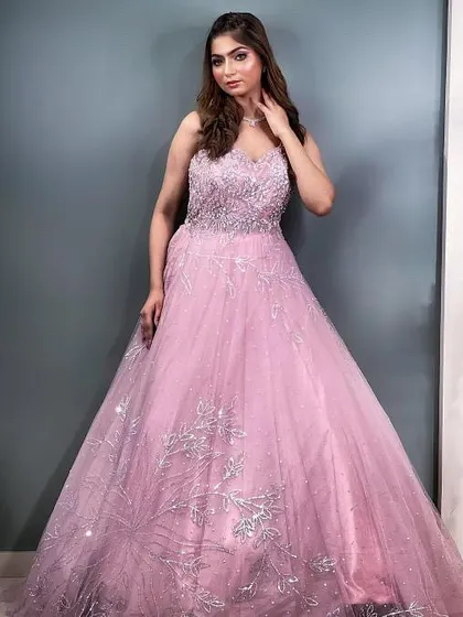 A full-length shot of the pink ball gown, a perfect rental for anyone who wants to feel like a princess for a day.