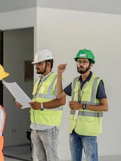 An identical shot of our engineers ensuring the construction work aligns perfectly with the approved design drawings.