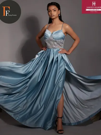 A dynamic shot capturing the movement of the blue gown, a great addition to our students' professional portfolios.