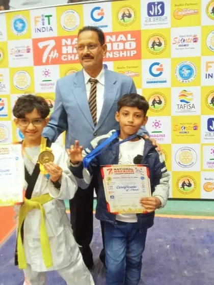 Sujal Nayak with his gold and silver medals from the national hapkido championship in West Bengal.