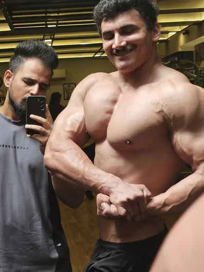 We create monsters. A powerful most muscular pose during the off-season, showing the raw size we are building.
