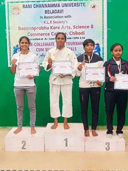 Our Judoka, Ramya, on the podium after winning a silver medal. Her success in Judo translates directly to a stronger grappling game in MMA.