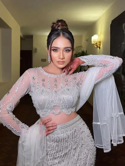 A confident pose in the Viraaya gown, perfect for a bride who wants a touch of modern glamour.