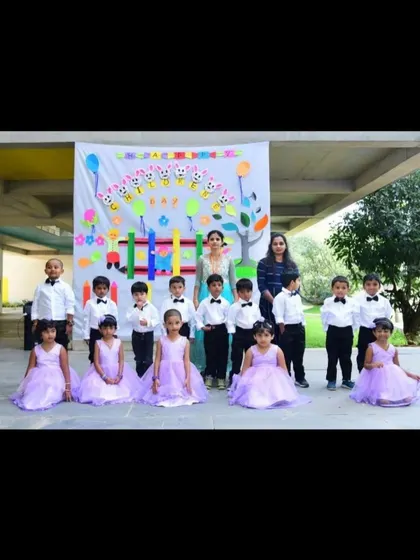 A sweet group of performers from Brigade School in shades of lilac and purple, showing how I can create a consistent theme across different styles.