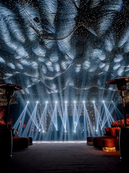 The stage is the focal point for performances. We designed this one with a ceiling of thousands of fairy lights, which can be programmed to create different effects, from a starry night sky to a high-energy light show.