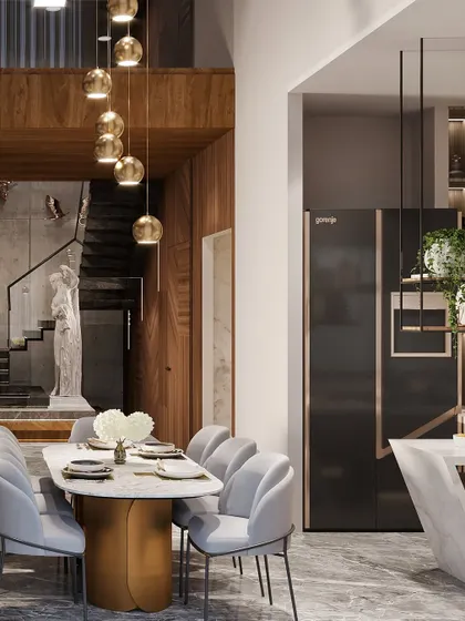 From the dining table, you can see the staircase and the kitchen, highlighting the seamless flow between the different zones of the home. The design is perfect for modern family living.