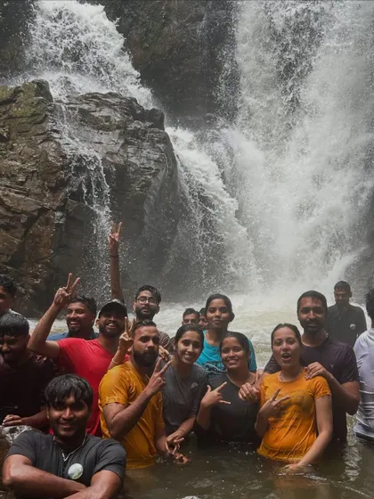 Our group having a blast, swimming and posing in a natural pool at Bandaje.