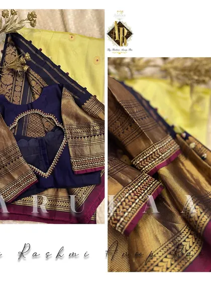 A navy blue blouse with a heart-shaped cutout at the back. The saree's original zari border is used on the sleeves, which are finished with a simple embroidered edge.