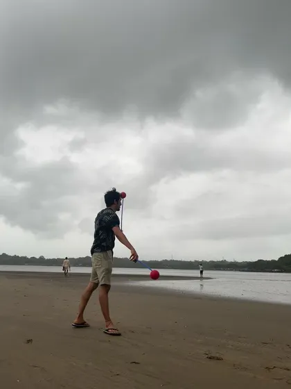A simple moment of practice on a cloudy day at the beach. Even basic poi spinning is a great form of active meditation, helping to clear the mind.