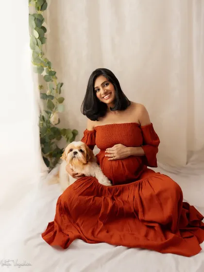Your fur babies are family too. I always welcome pets into my studio because they are part of your story. Capturing the bond between you and your first baby before the new one arrives is such a sweet and precious memory.