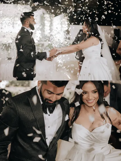 The couple's joyful exit, showered with confetti as they walk hand-in-hand.
